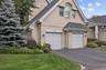 Attached garage with driveway.