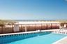 Pool with beach access