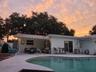 Covered patio area to pool and family room