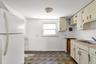 Cabinets for storage and fridge-No stove