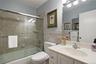 Hall bath with tub and shower