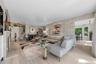 Alternate view of Family Room from the Living Room with a view of the beautiful Kitchen