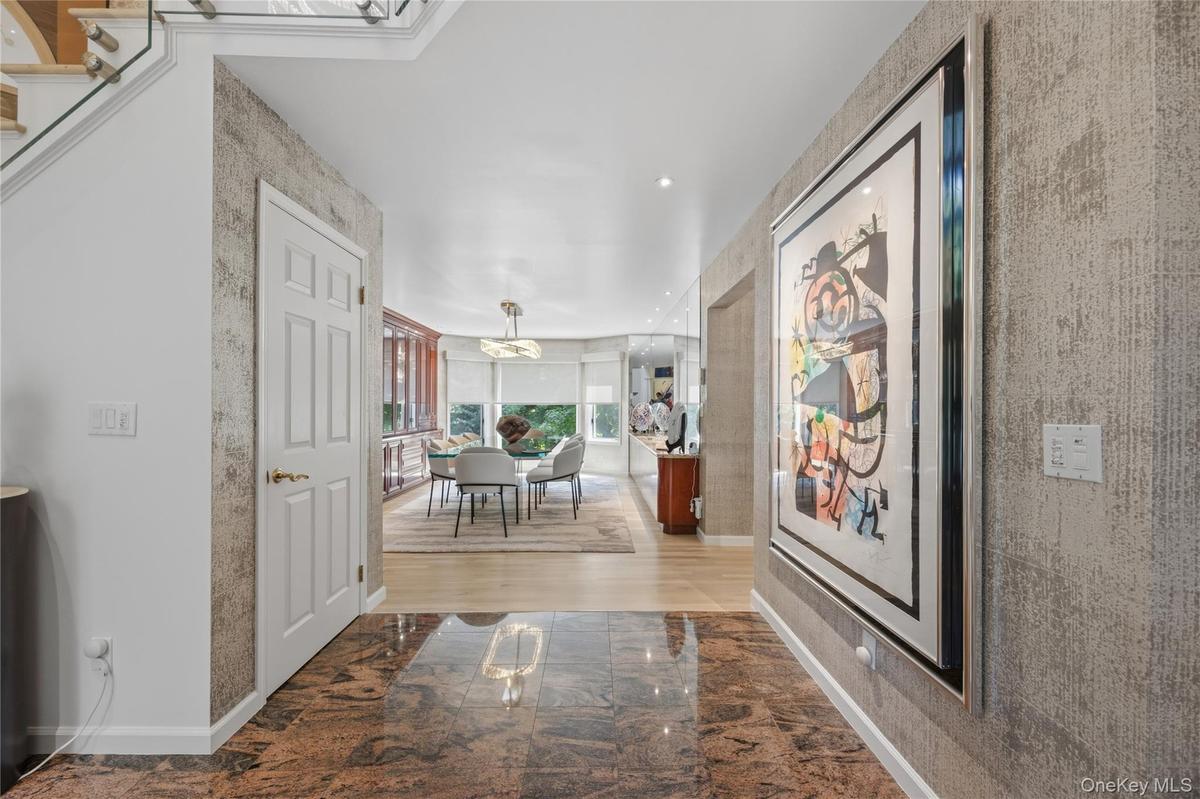 View from entrance foyer through to the sunlit Dining Room