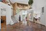 Back down through dramatic entrance foyer to Lower Level