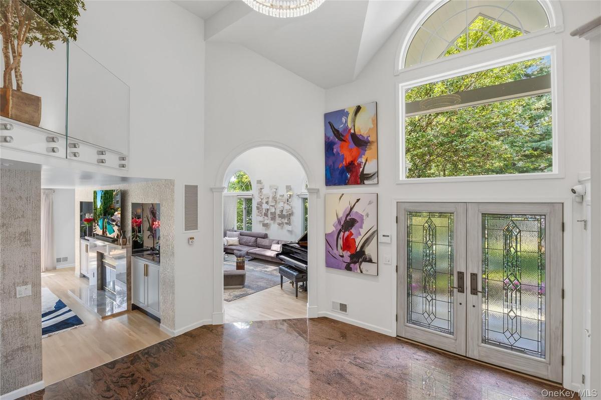 Breathtaking Entry Foyer-perfect for displays of art and filled with natural light