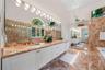 Huge Primary Bathroom  with marble double sink vanity