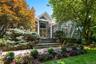 Custom designed and built contemporary colonial with professional landscaping and privacy.