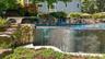 Infinity Edge of the free form pool with stone outcroppings