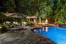 Enjoy relaxing by the pool in the evenings right into the fall with a firepit for warmth