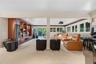 Track/recessed lighting, two double wide closets, sliding glass door to backyard patio