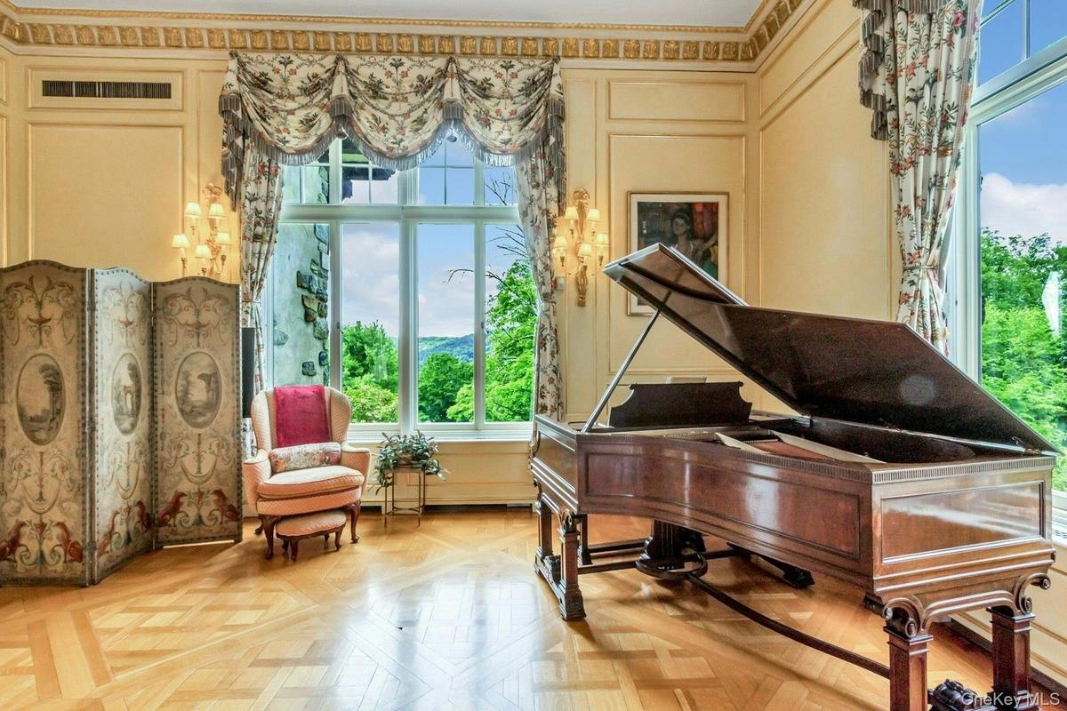 Living area featuring a decorative wall