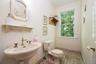 First floor powder room, just off the office.