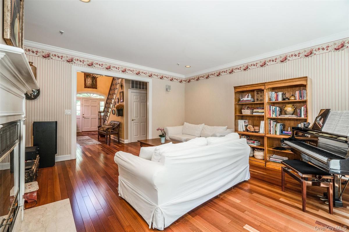 Another view of your family room, showing the front door in the distance.