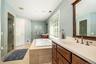 Your morning prep just got a lot easier. With a private water closet, thoughtful storage throughout, and a spacious walk-in closet, this primary bathr