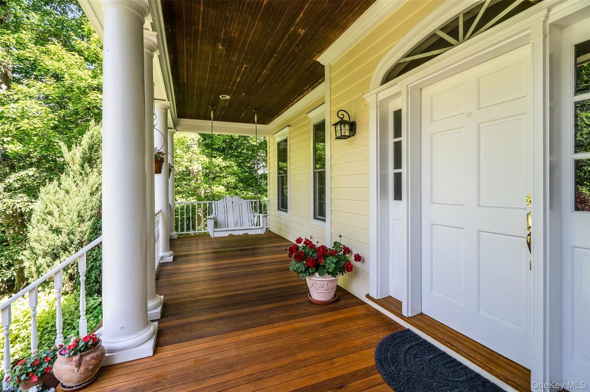 Your new favorite hangout: a wide, covered front porch made for coffee breaks and evening drinks, all with a beautiful view of your private lawn.