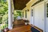 Your new favorite hangout: a wide, covered front porch made for coffee breaks and evening drinks, all with a beautiful view of your private lawn.