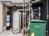 Water heater, boiler, and water filtration system