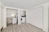 There is a door that leads out to the yard from this 4th Bedroom