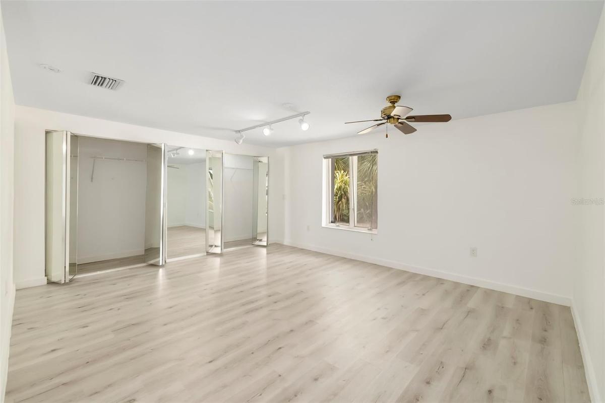 There are two primary bedrooms with full baths to choose from