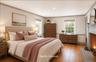Make the primary bedroom with fireplace your own sanctuary