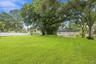This hidden gem will allow you to embrace a quiet, relaxed lifestyle with nearly an acre of beautifully landscaped grounds to enjoy.