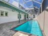 Above the 38-foot heated saltwater pool is the nearly 800 square foot in-law suite