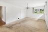 Primary Bedroom (Hardwood Under Carpet)