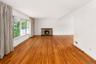 Living Room with Wood Burning Fireplace