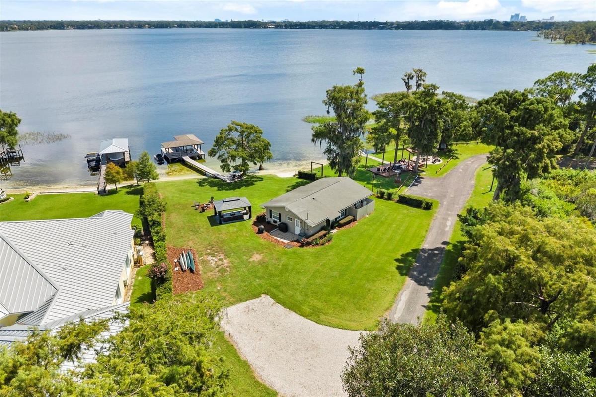 RARE LAKE SHEEN LAKEFRONT ESTATE OPPORTUNITY ON THE BUTLER CHAIN OF LAKES!