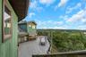 Expansive multi-level wood deck, outdoor entertainment area, and skylights