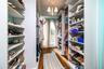 Closet Room with an entrance to the private deck