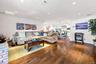 Seamless flow from open concept kitchen to family room.
