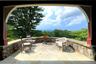 Whether you are entertaining a hundred or simply yourself, this is a striking place to relax as the park-like grounds unfold below.