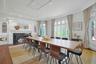 The expansive dining room (used now as a conference area) is open to the living room. Clearly, there is ample space for large dinner parties! Sliding 