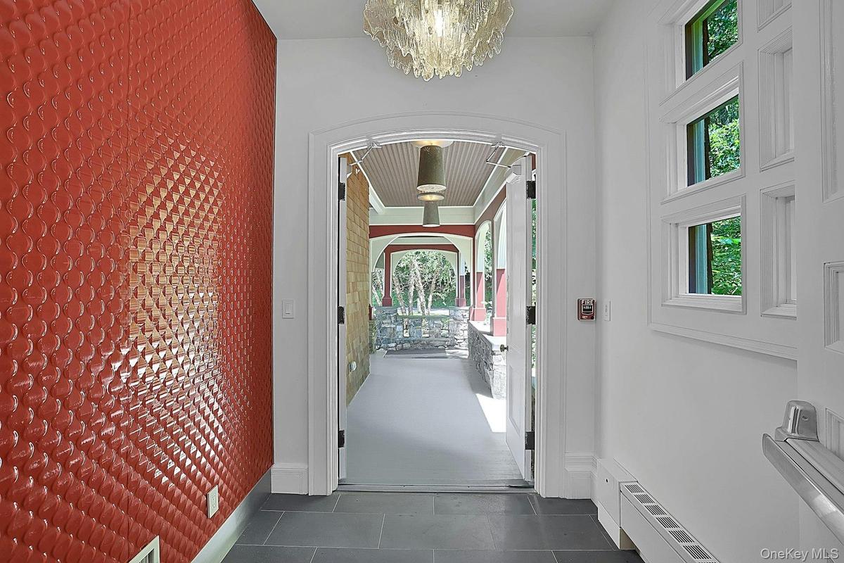 The first hint of the countless updates that have been made at this property. When you first enter the foyer through the original double doors, you wi