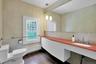 This is one of two half bathrooms on the second floor. The thoughtful updates are evident throughout this space.