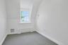 One of two bonus rooms on the upper level. How would you use this space?