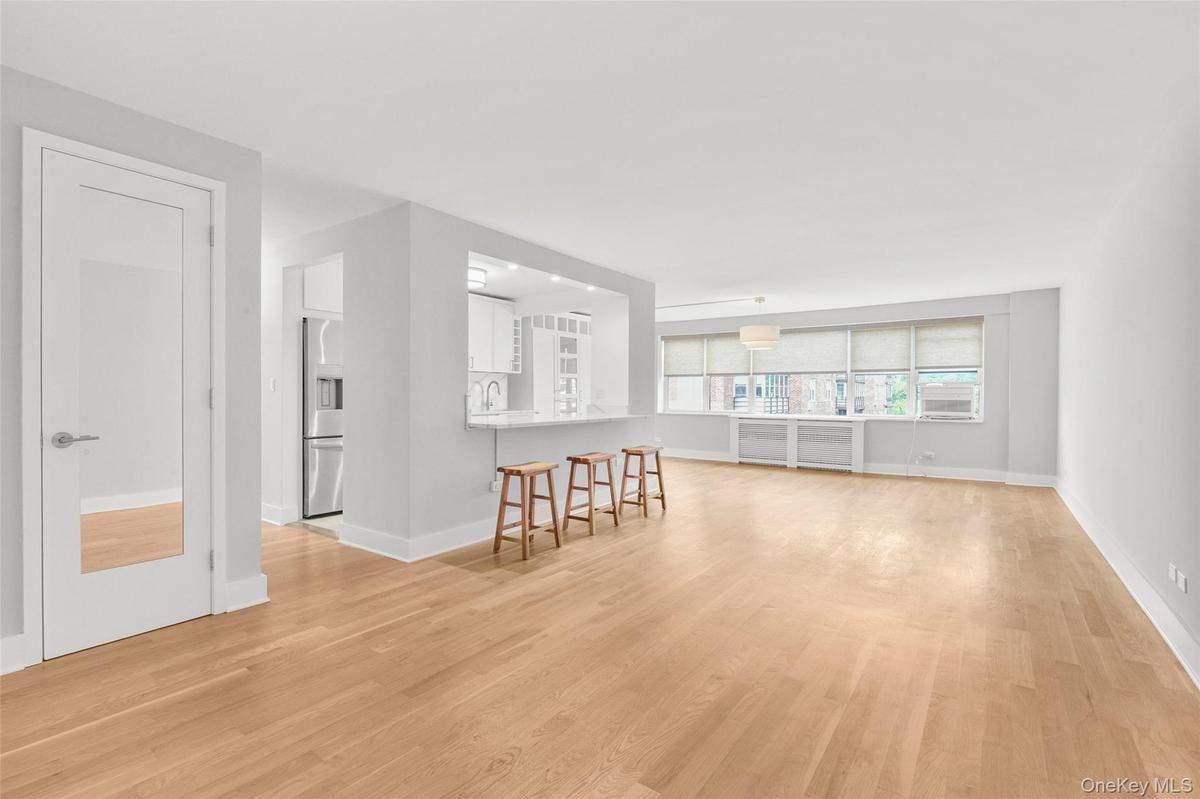 White oak hardwood flooring throughout open concept living space