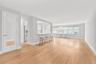 White oak hardwood flooring throughout open concept living space