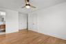 Primary bedroom, featuring two double-door closets, ensuite bathroom and space for stackable Washer/Dryer unit