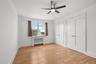 Secondary bedroom, two double-door closets