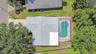 Rare pool home on the lake even looks clean from the sky