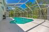 Screened pool area is a private retreat with lake and preserve as your rear neighbor