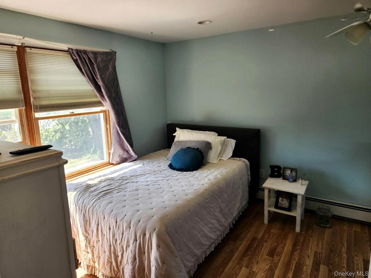 Wood-finish flooring with baseboard heating