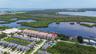 This waterfront home is located in a gated, luxury waterfront community that boaters and nature lovers will adore!