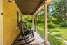 Covered front porch. Ideal for entertaining or relaxing