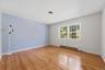 Bedroom 2 with hardwood floors