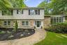 Stone front with large bow window