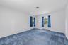 Bedroom 3 with HW floors under carpet