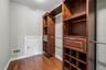 One Of Two Primary Walk In Closets